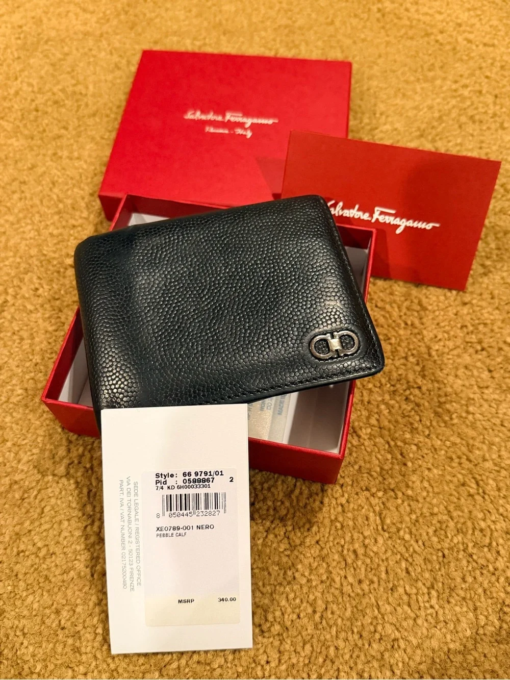 Salvatore Ferragamo Black Pebbled Leather Bi-Fold Wallet with Metal Logo